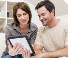 couple viewing responsive medical website on tablet