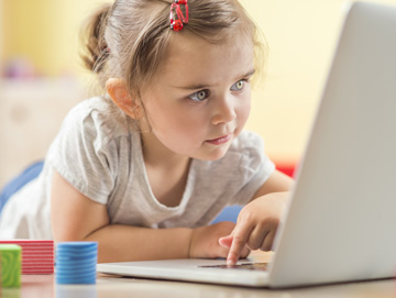 little girl on computer